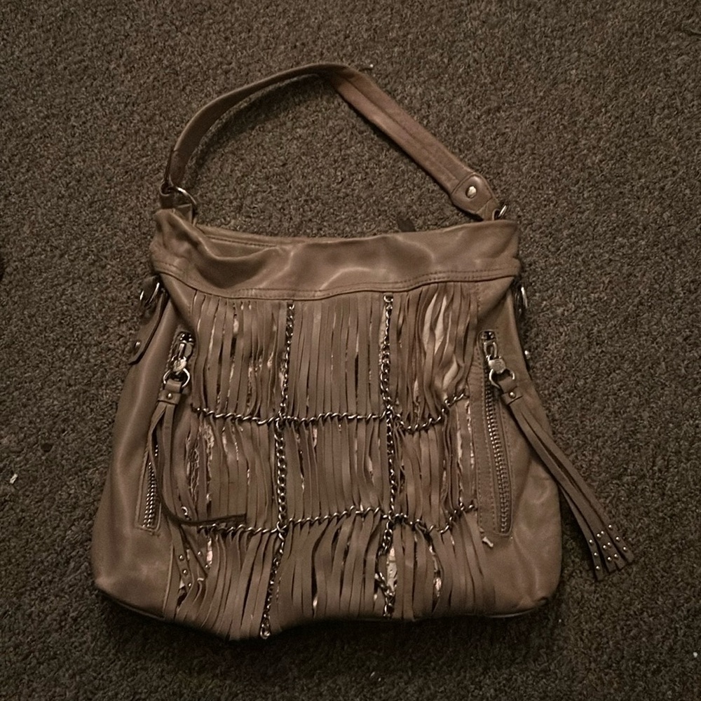 Purse with tassels and chains